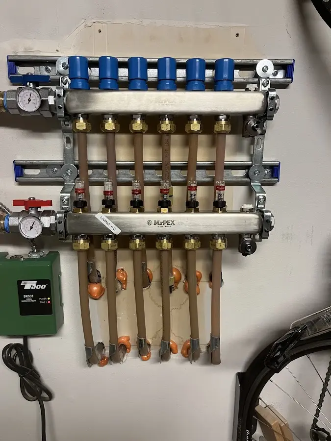 Plumber performing Gas Leak Detection at a residential property in Bayonne